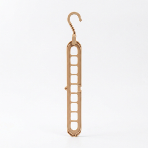 Our signature 9-hook space hanger in a soft warm beige. Holds up to 9 garments in the space of one, with a 360° rotating head for any closet configuration.