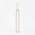 Our signature 9-hook space hanger in a clean white cream. Holds up to 9 garments in the space of one, with a 360° rotating head for any closet configuration.