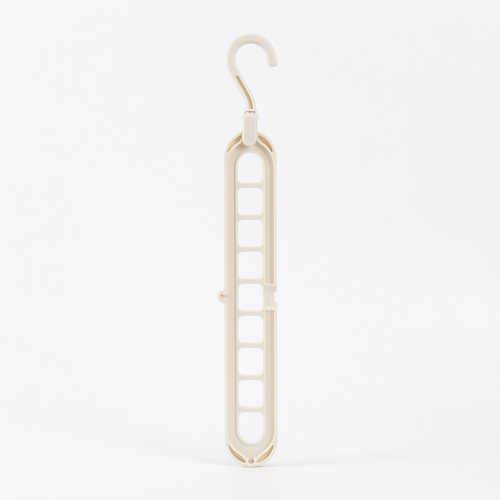 Our signature 9-hook space hanger in a clean white cream. Holds up to 9 garments in the space of one, with a 360° rotating head for any closet configuration.